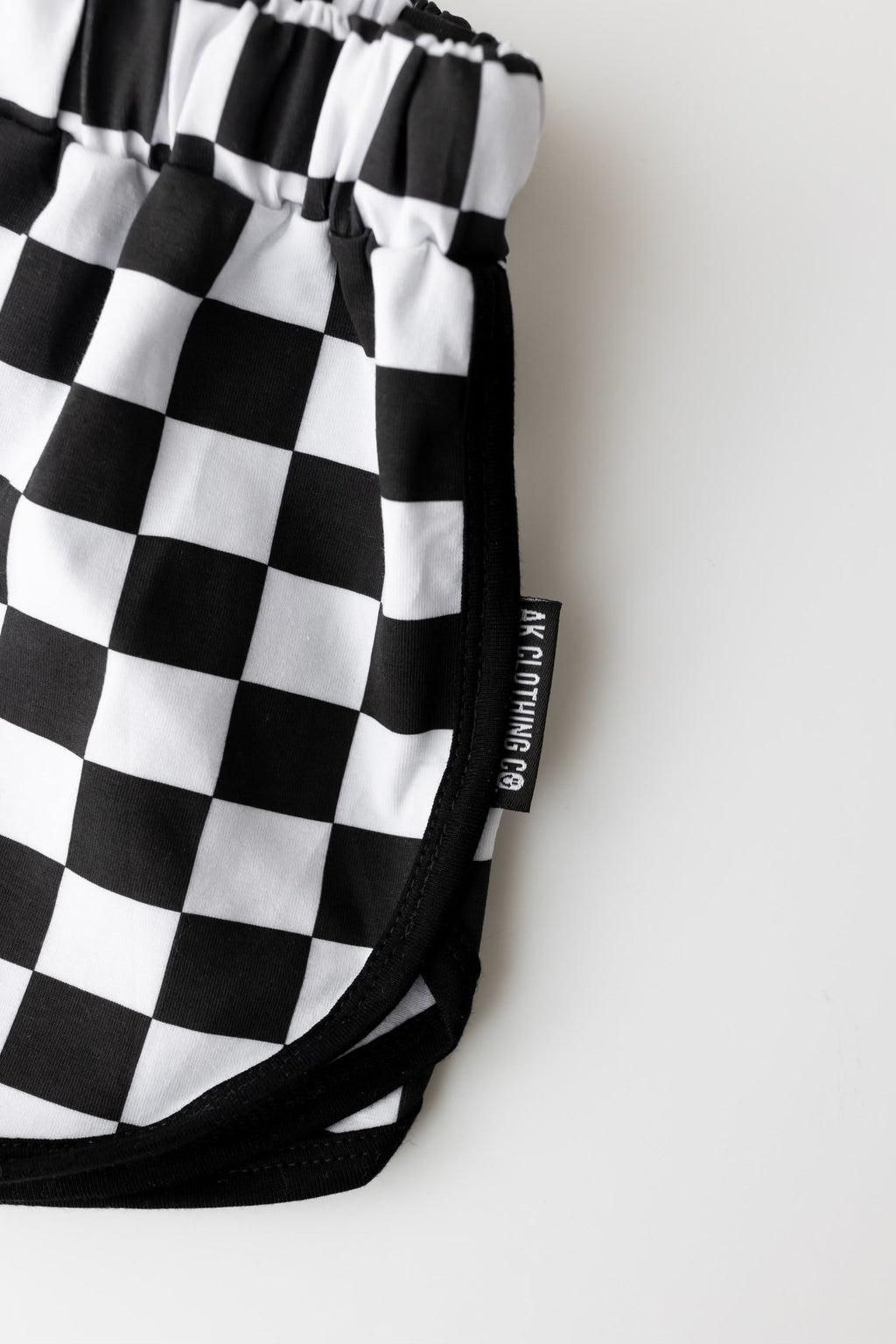 AK checker track shorts